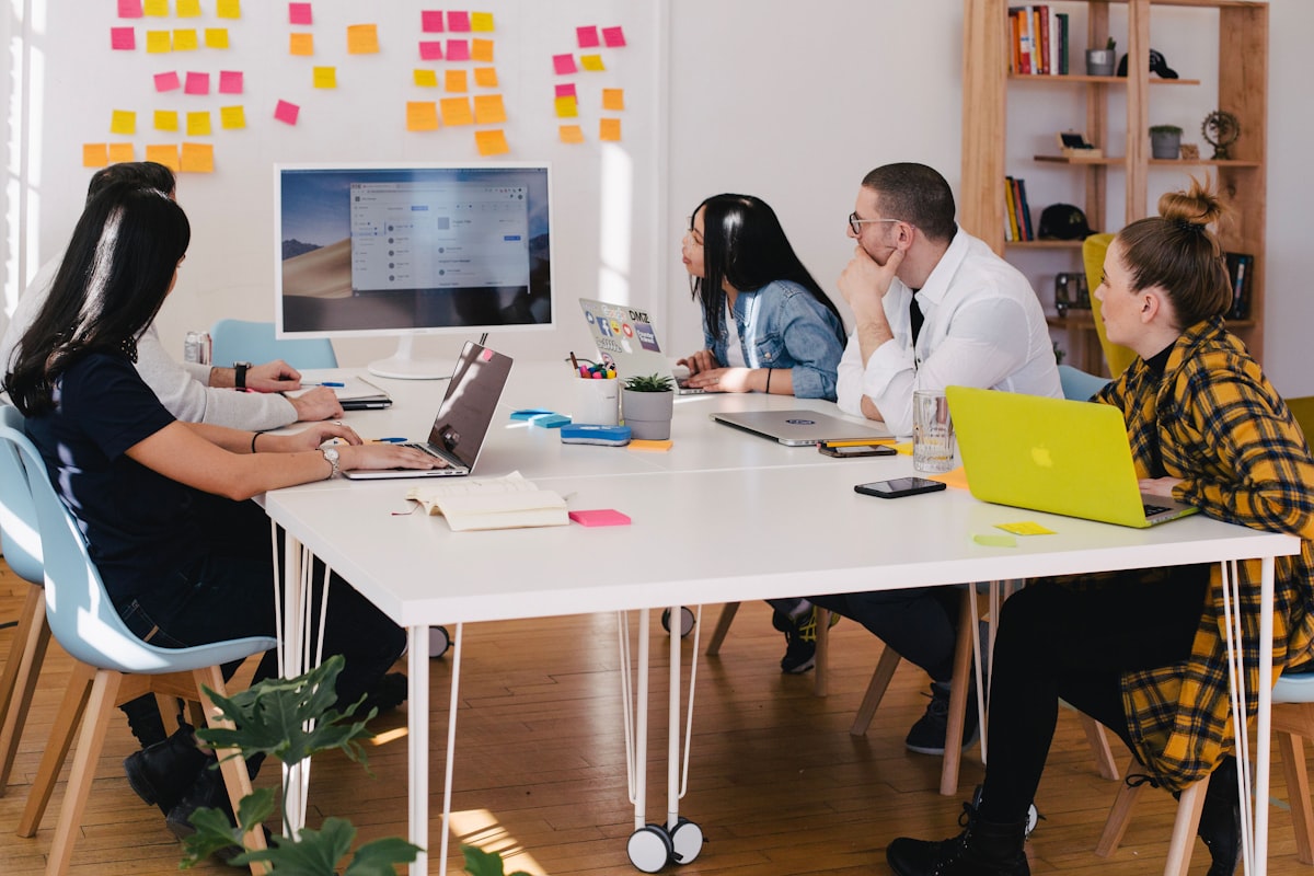Professional confidently asking manager for promotion during performance meeting - ask for a promotion and actually get one