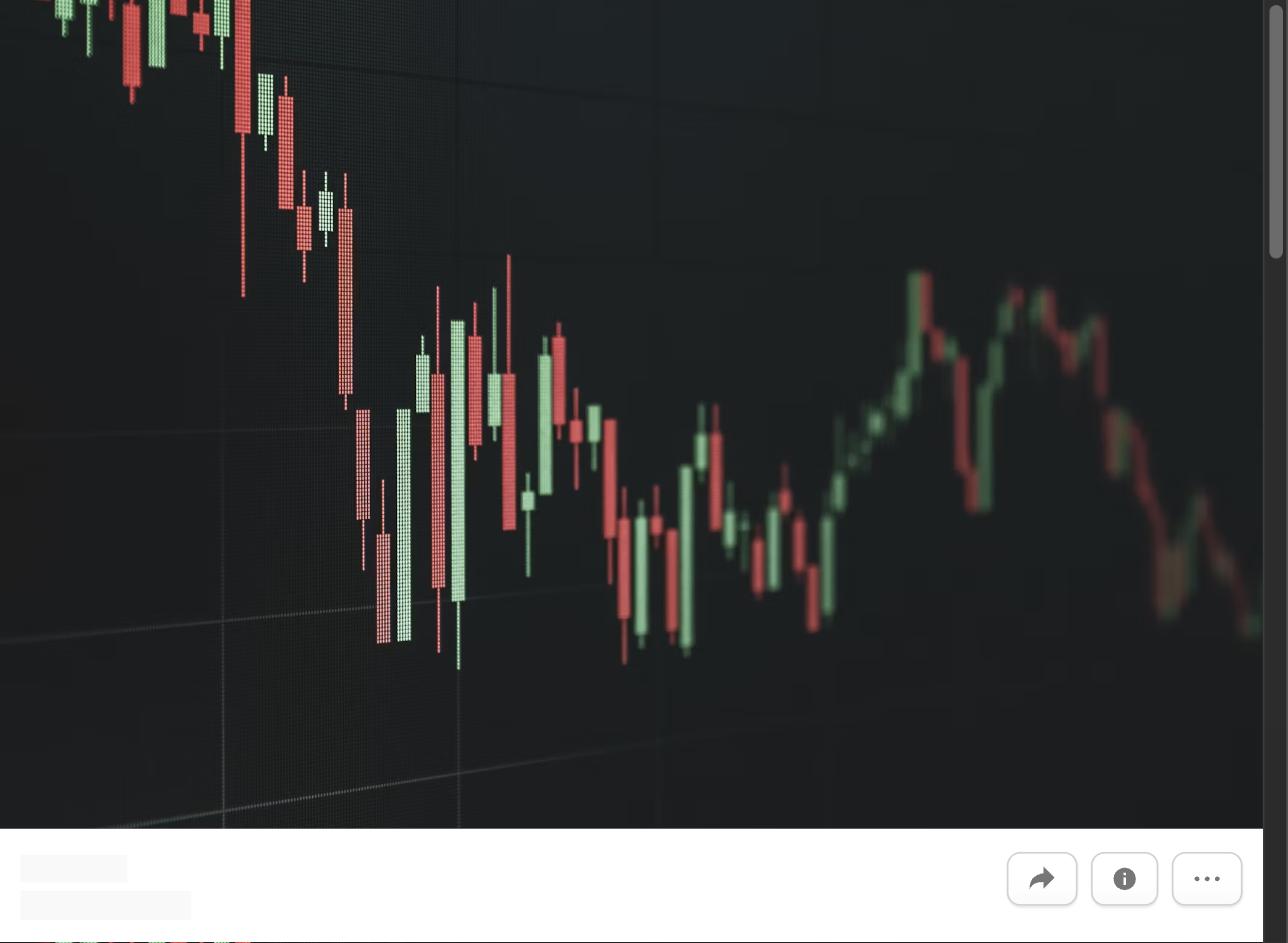 A declining stock market chart on a dark screen, representing job searching during an economic downturn