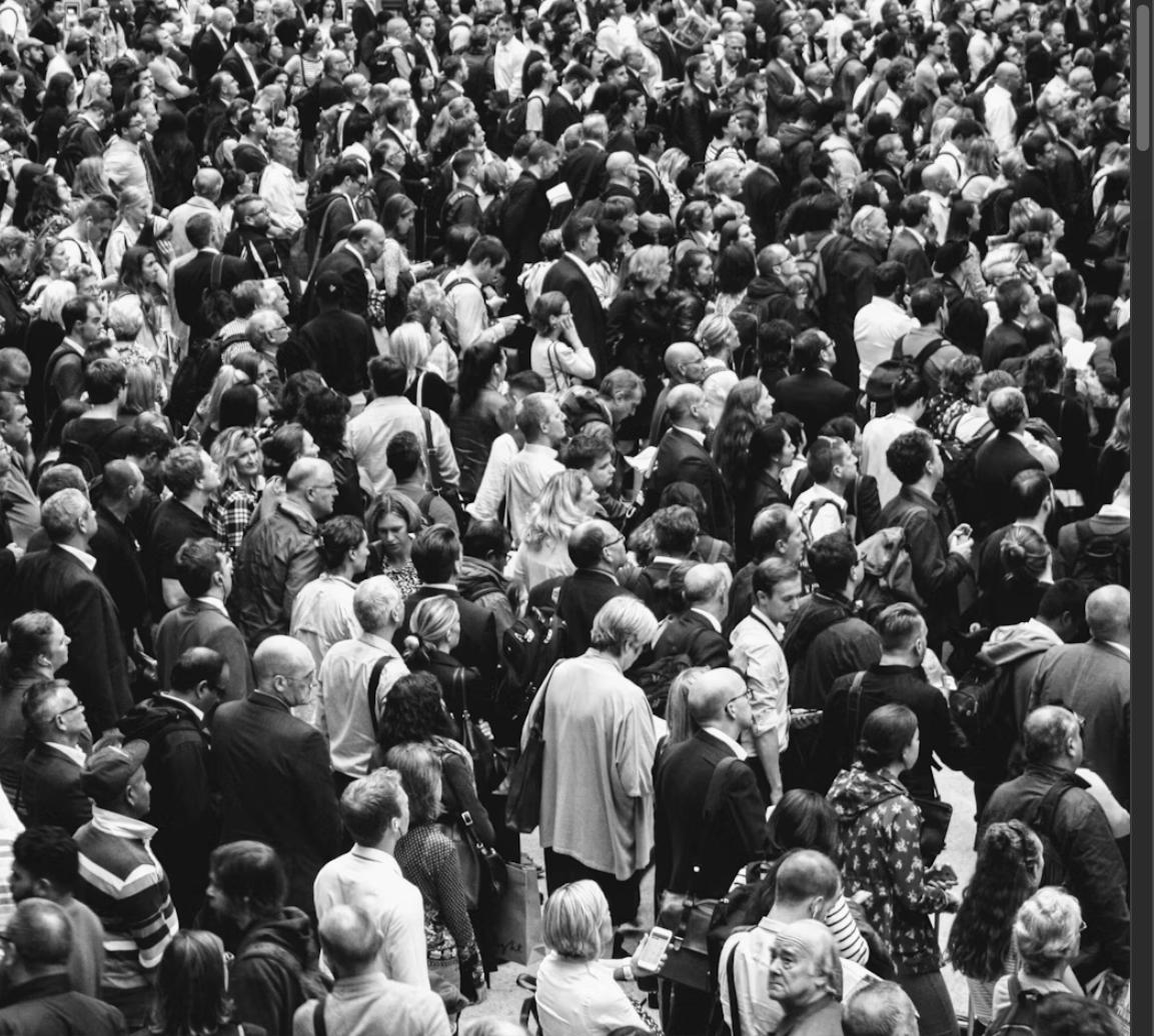 Large crowd of people, representing a tight and competitive job market