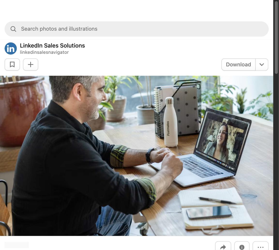 Man on a video call interview using a laptop at home
