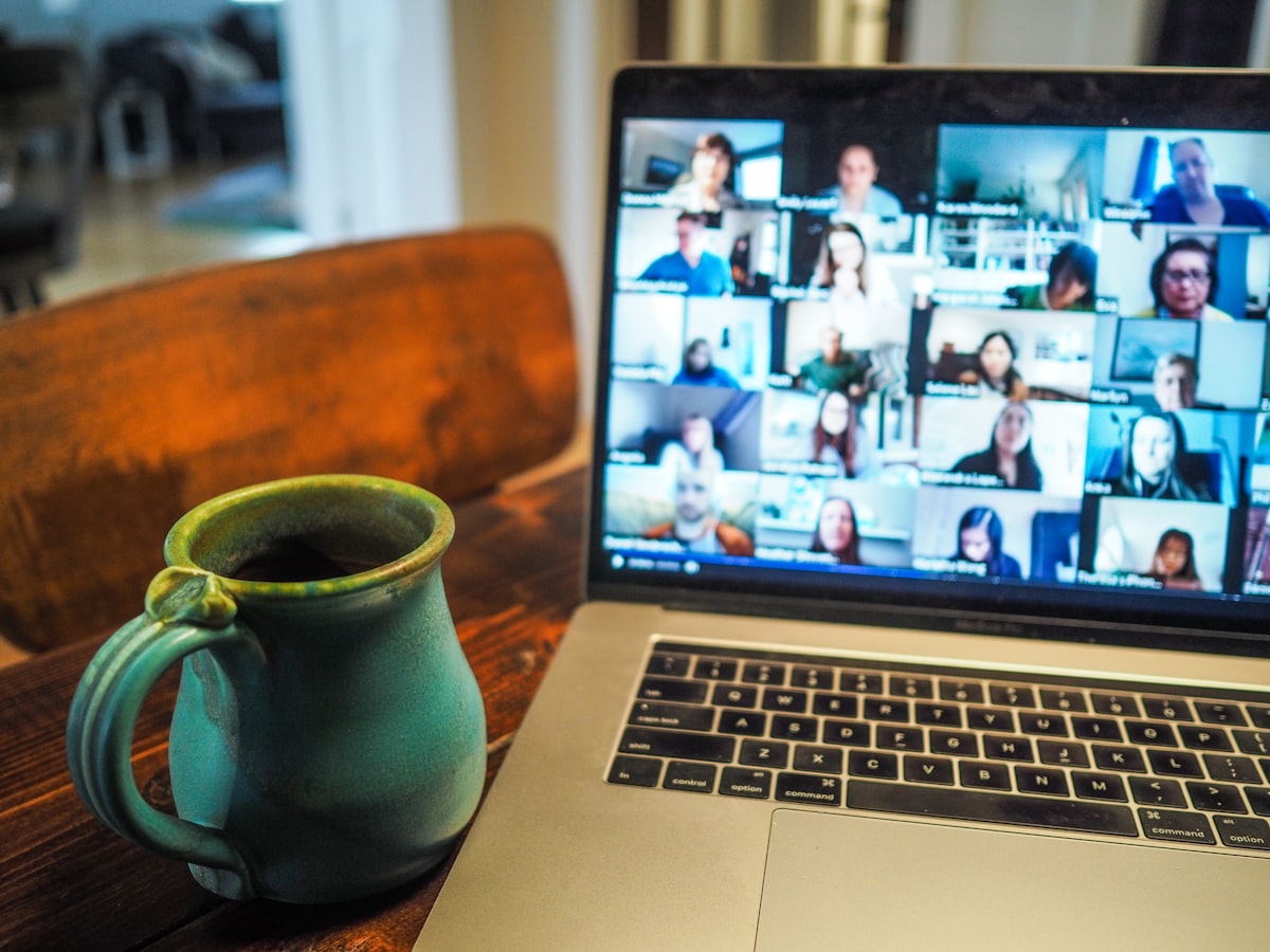 Professional working from modern home office setup negotiating remote arrangement - negotiate remote work in a job offer