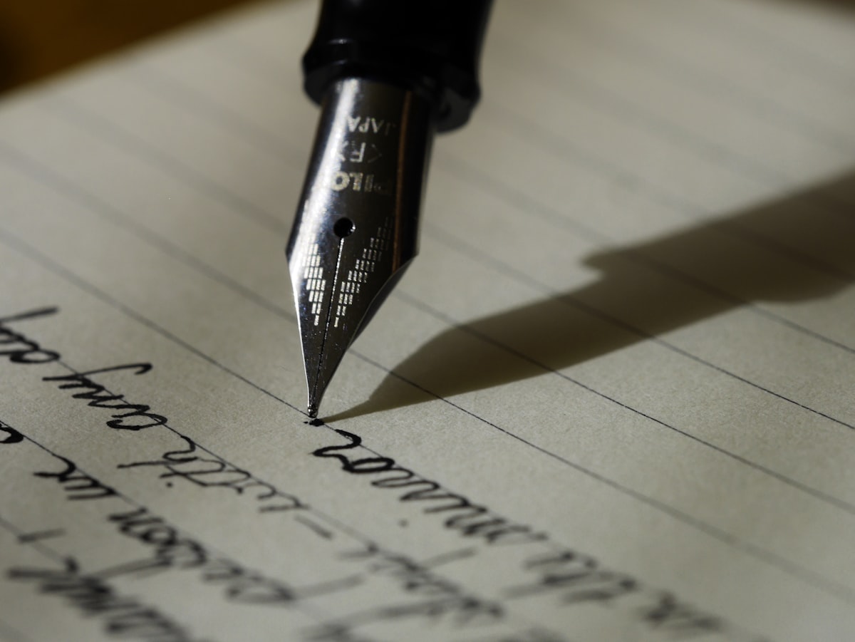 Professional editing resume with powerful action verbs highlighted on screen - the best resume action verbs that actually get