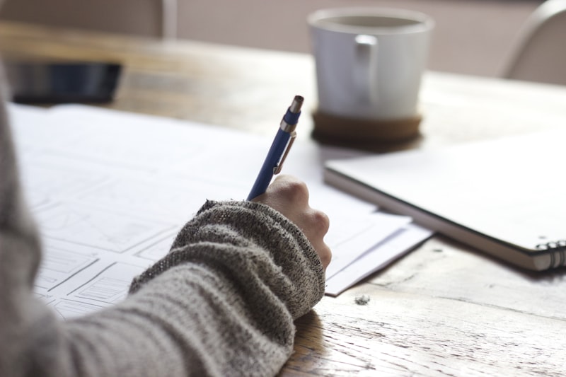 Person customizing resume for specific job application - tailor your resume for each job application