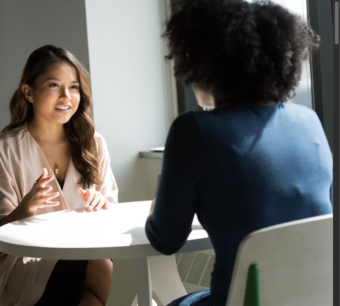 Two women having a conversation during a job interview