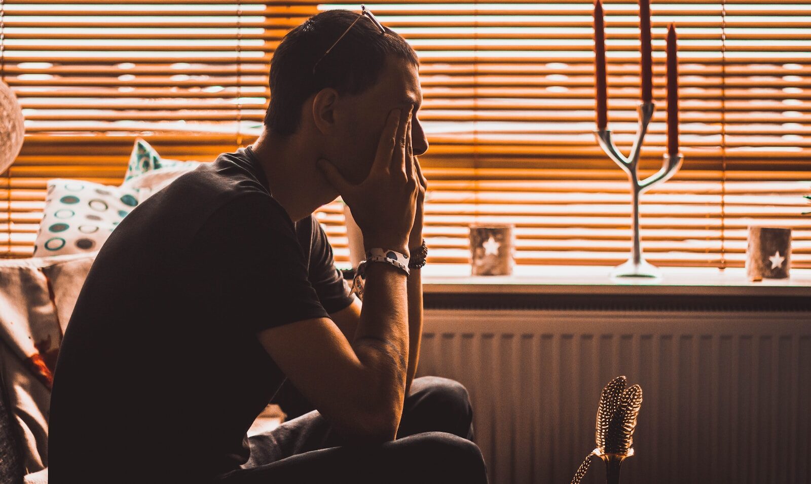 Man looking stressed and discouraged after a difficult job interview