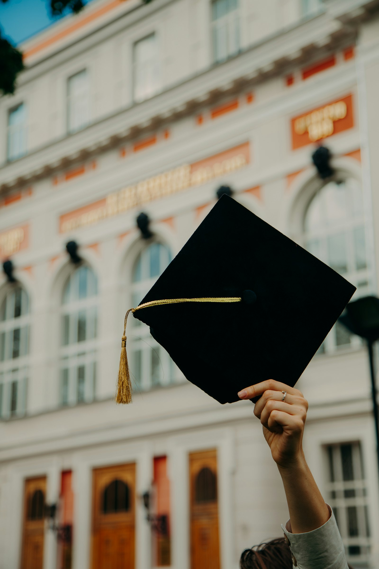 Graduation cap and academic setting representing an academic career