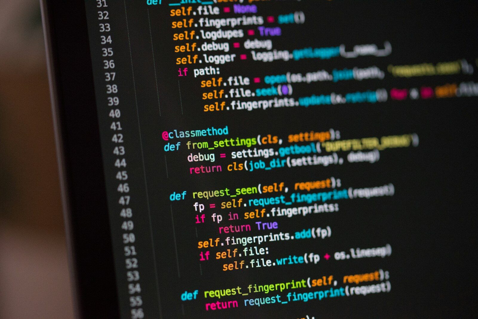 Close-up of programming code on a screen, representing a self-taught tech career path