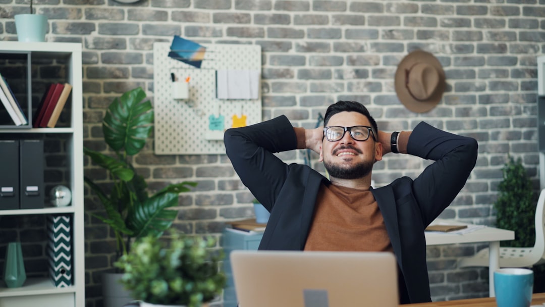 Employee taking a calm break at their desk, setting work boundaries