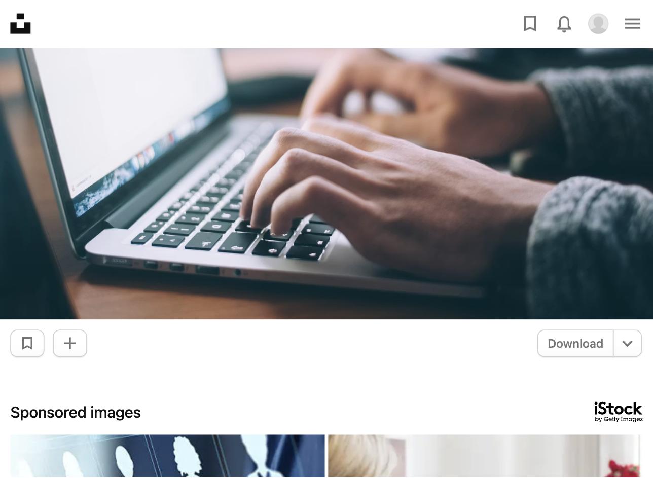 Recruiter typing on a laptop, representing how recruiters search resume keywords