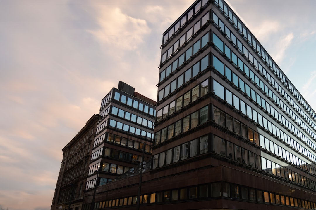 Modern office building representing return to office mandates