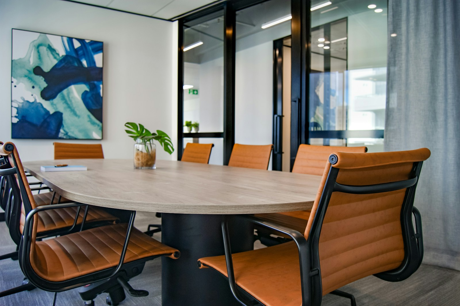 Two colleagues discussing career goals at a one-on-one meeting