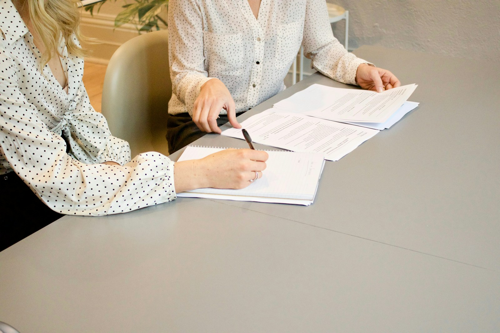 Reviewing and signing a job offer after successfully negotiating salary