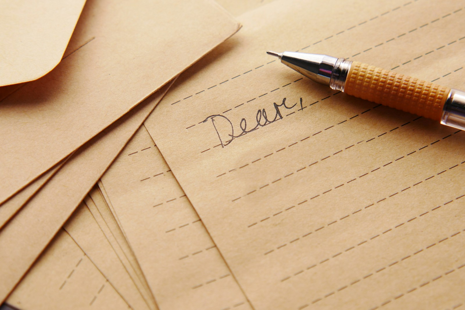 A fountain pen writing a handwritten letter, illustrating the lost art of resume thank you letters