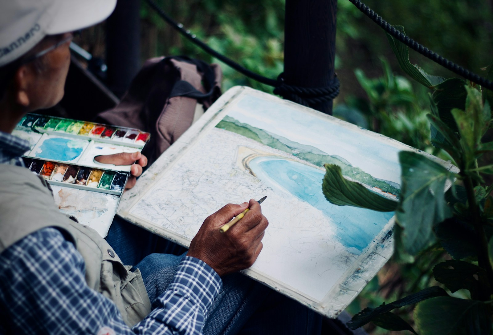 A retiree painting outdoors, one way to use your strengths and talents in retirement