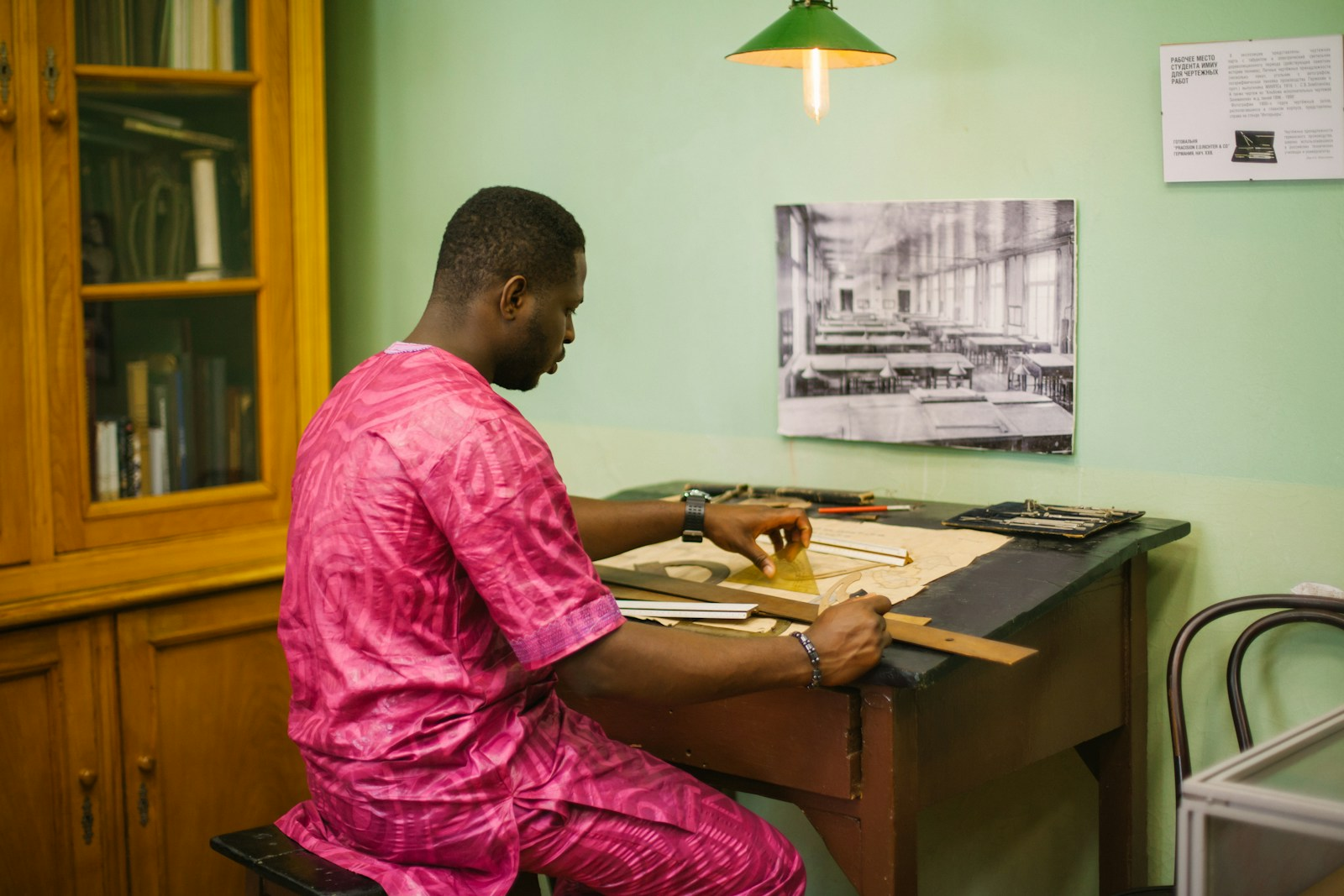 A graduate student studying counseling textbooks, preparing for the practice of the therapy profession