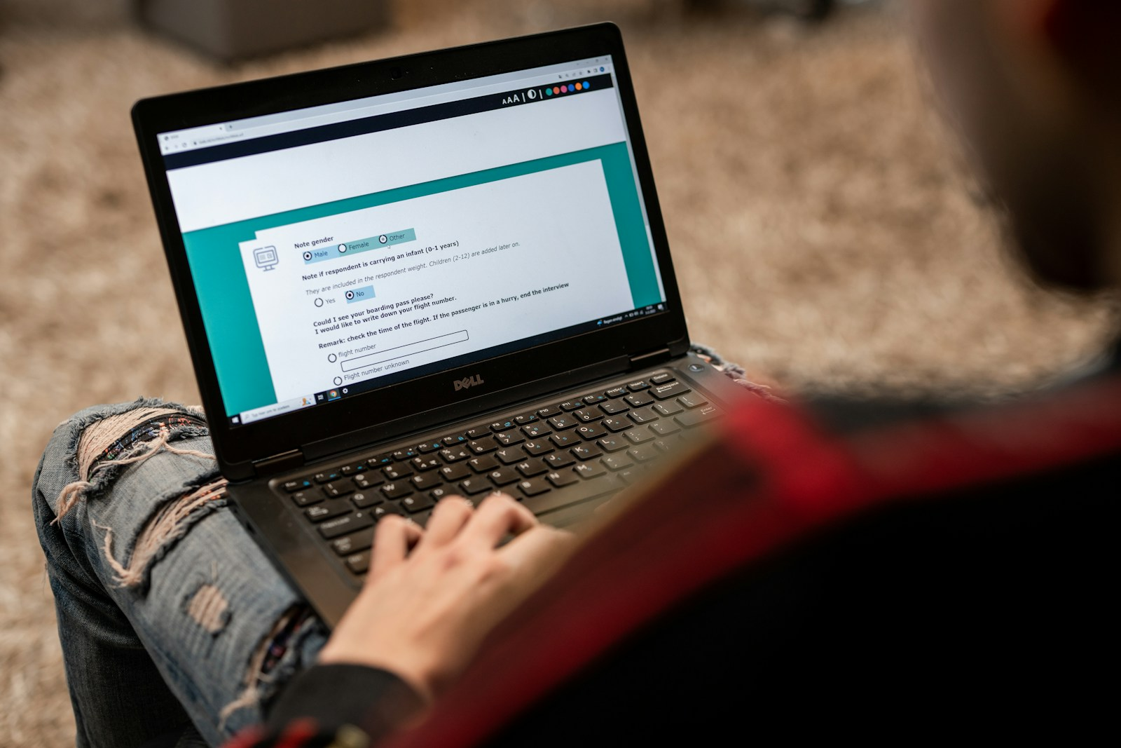 A person taking a personality assessment on a laptop, exploring the perfect career for your personality