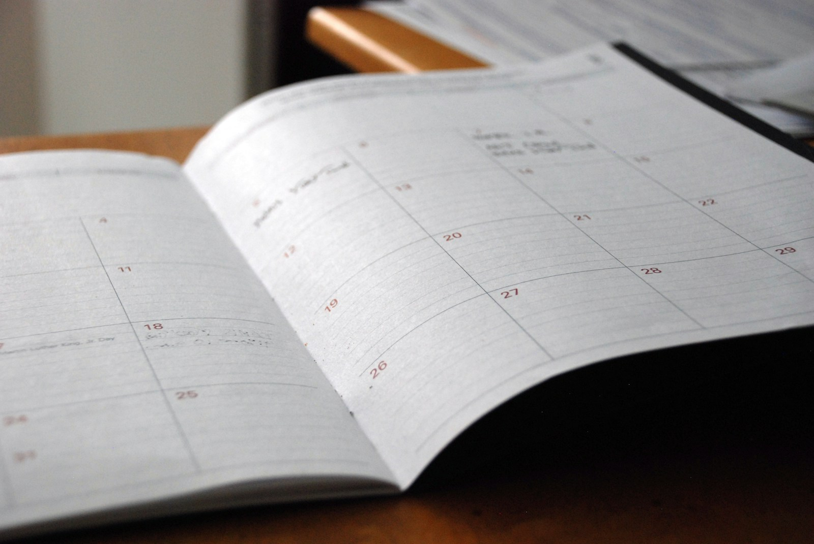 A calendar marked with planning dates, representing long-term career planning around the AI 2040 scenario timeline