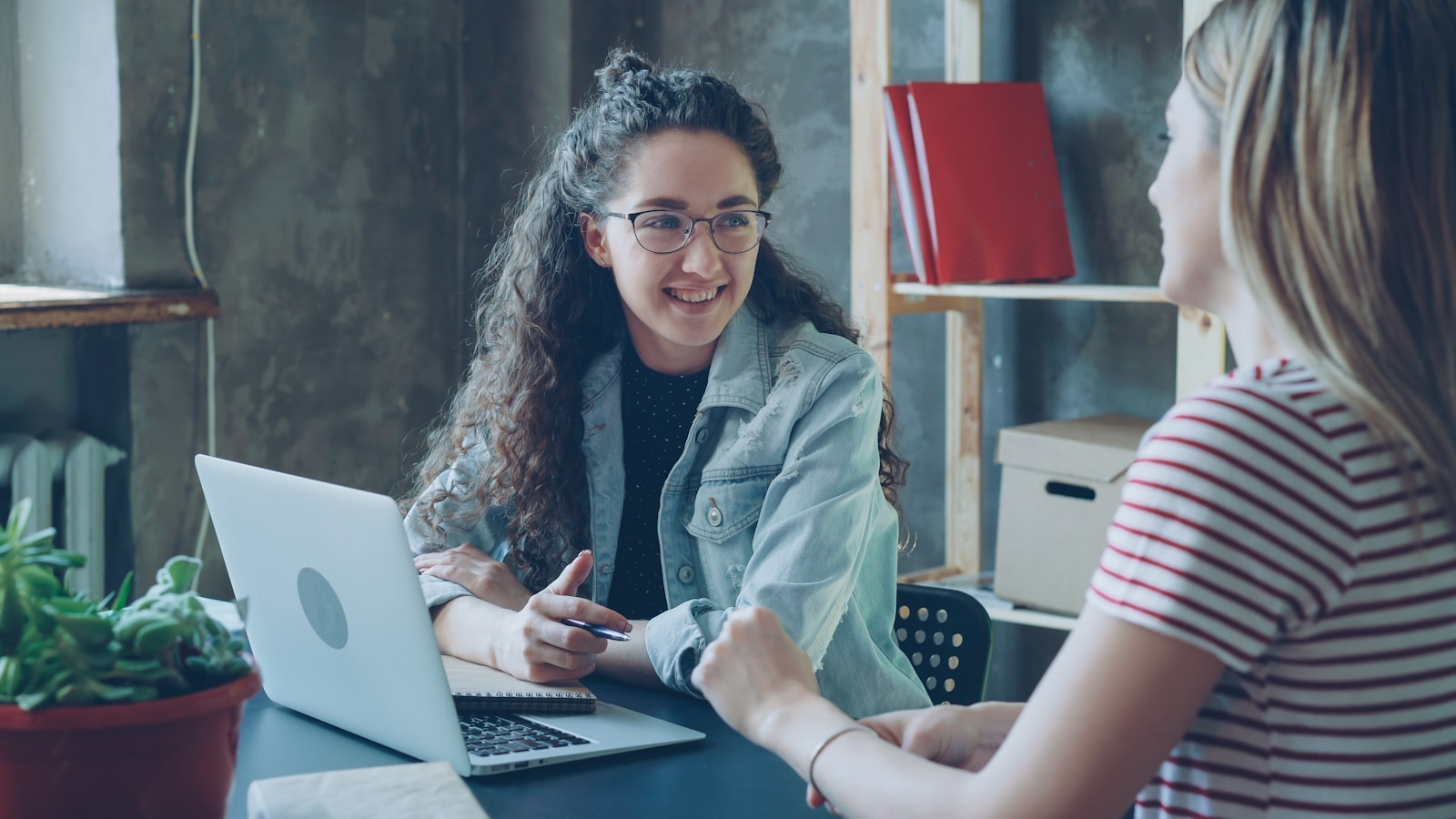 A career counselor reviewing personality test results with a client, discussing the perfect career for your personality