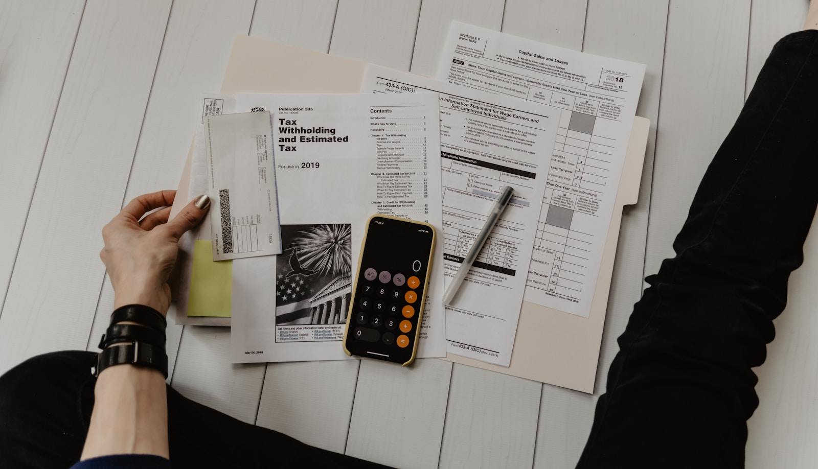 A freelancer reviewing an invoice, one of the practical basics of freelance jobs